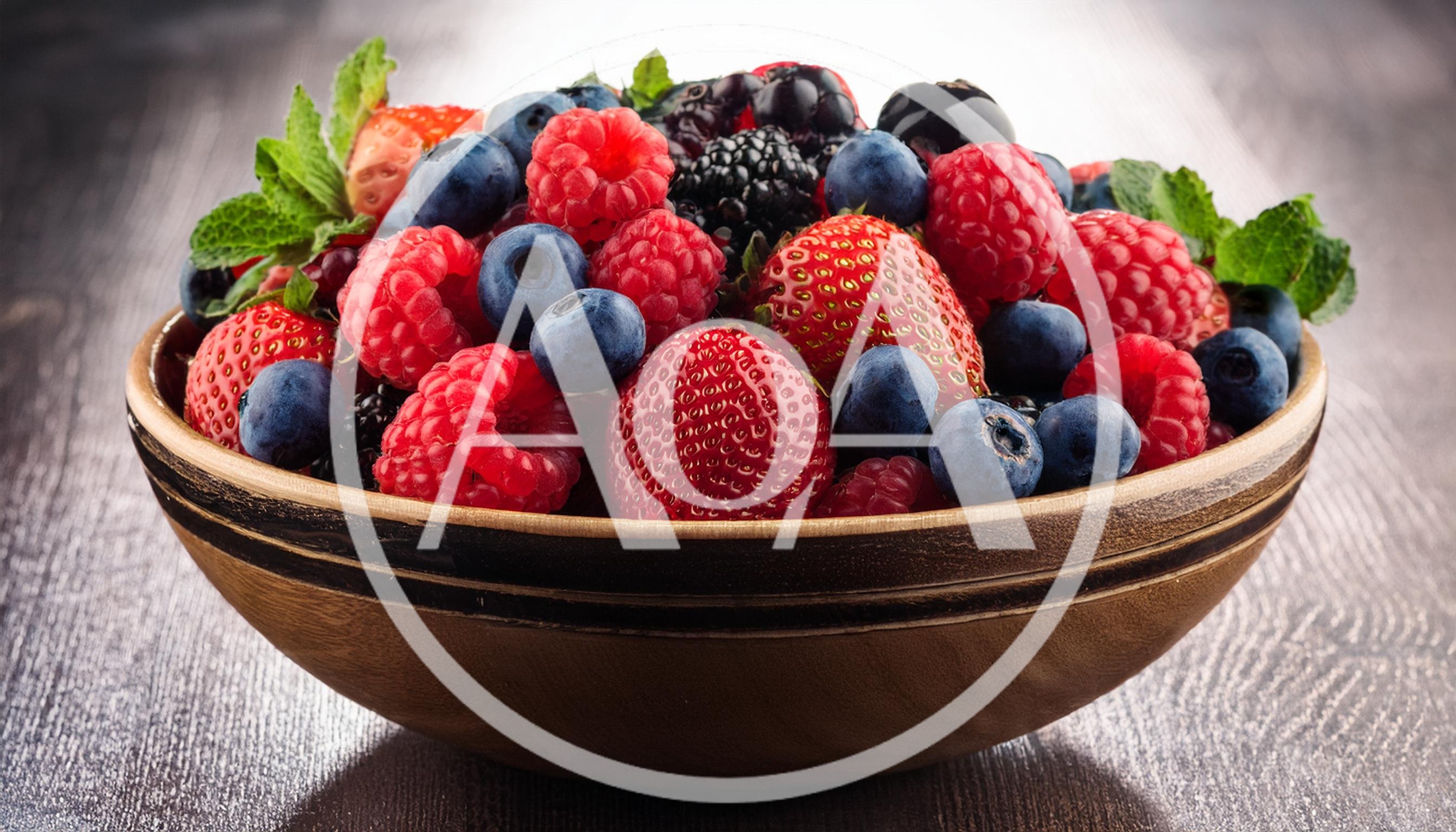 Fresh Mixed Berries In A Rustic Wooden Bowl