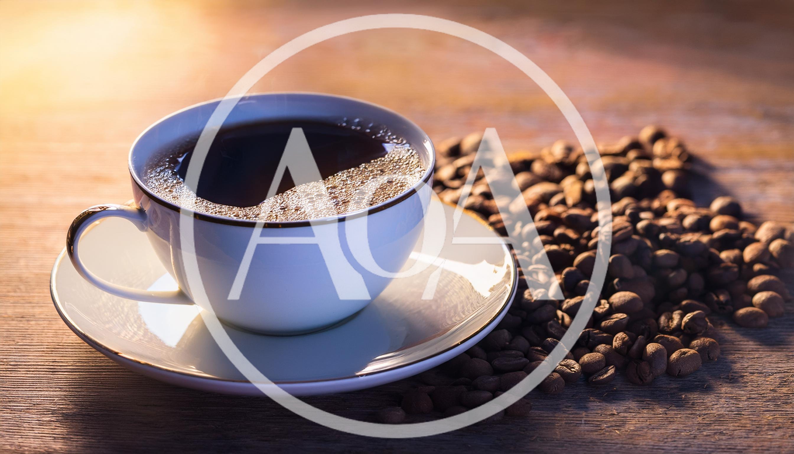 Cup Of Hot Coffee With Roasted Beans