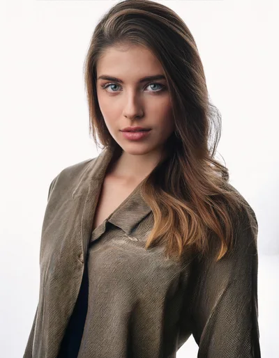 Portrait Of A Young Woman In A Brown Jacket
