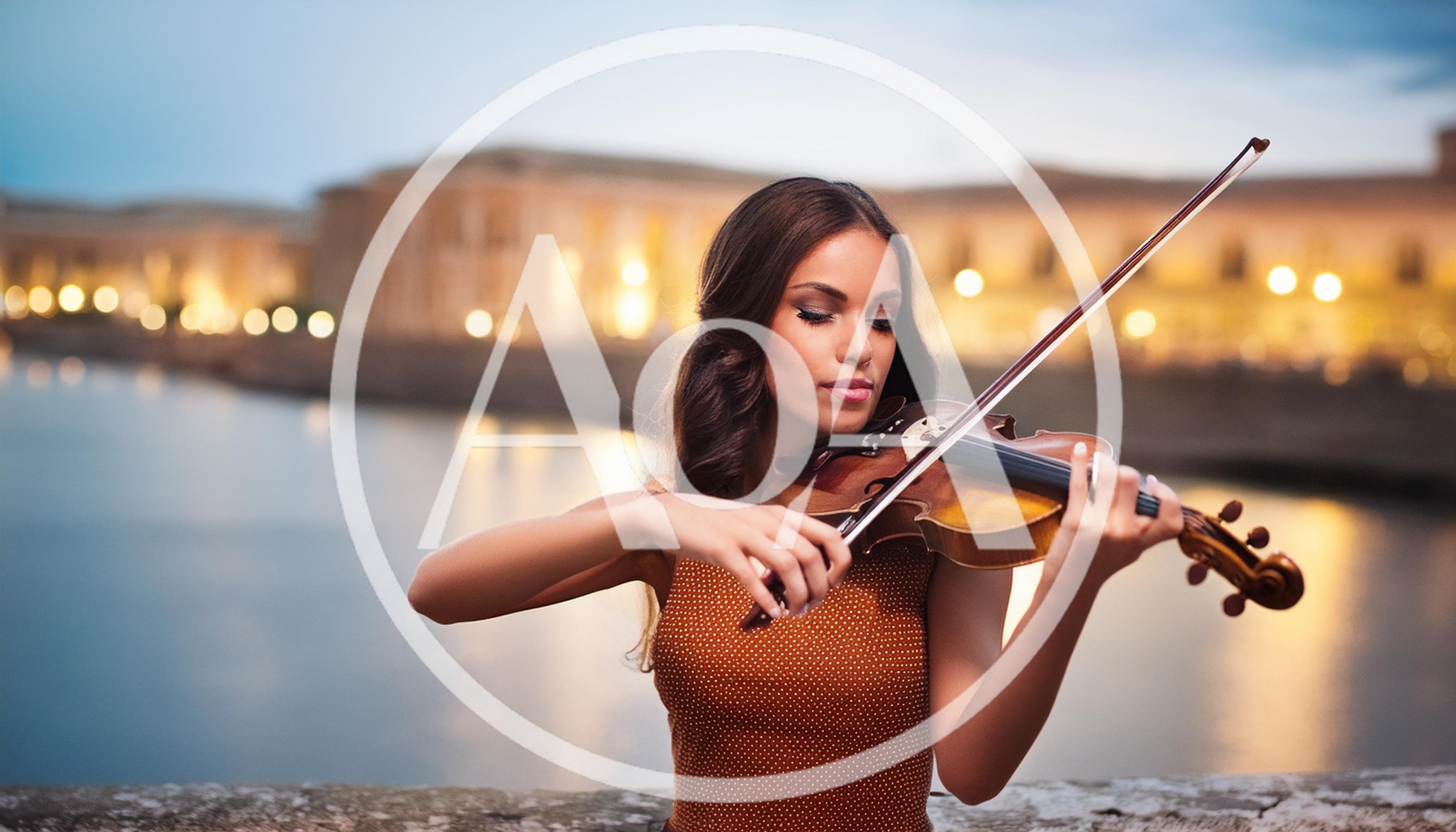 Young Woman Playing Violin Outdoors At Twilight
