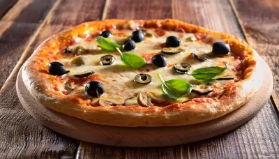 Fresh Homemade Pizza With Olives And Basil