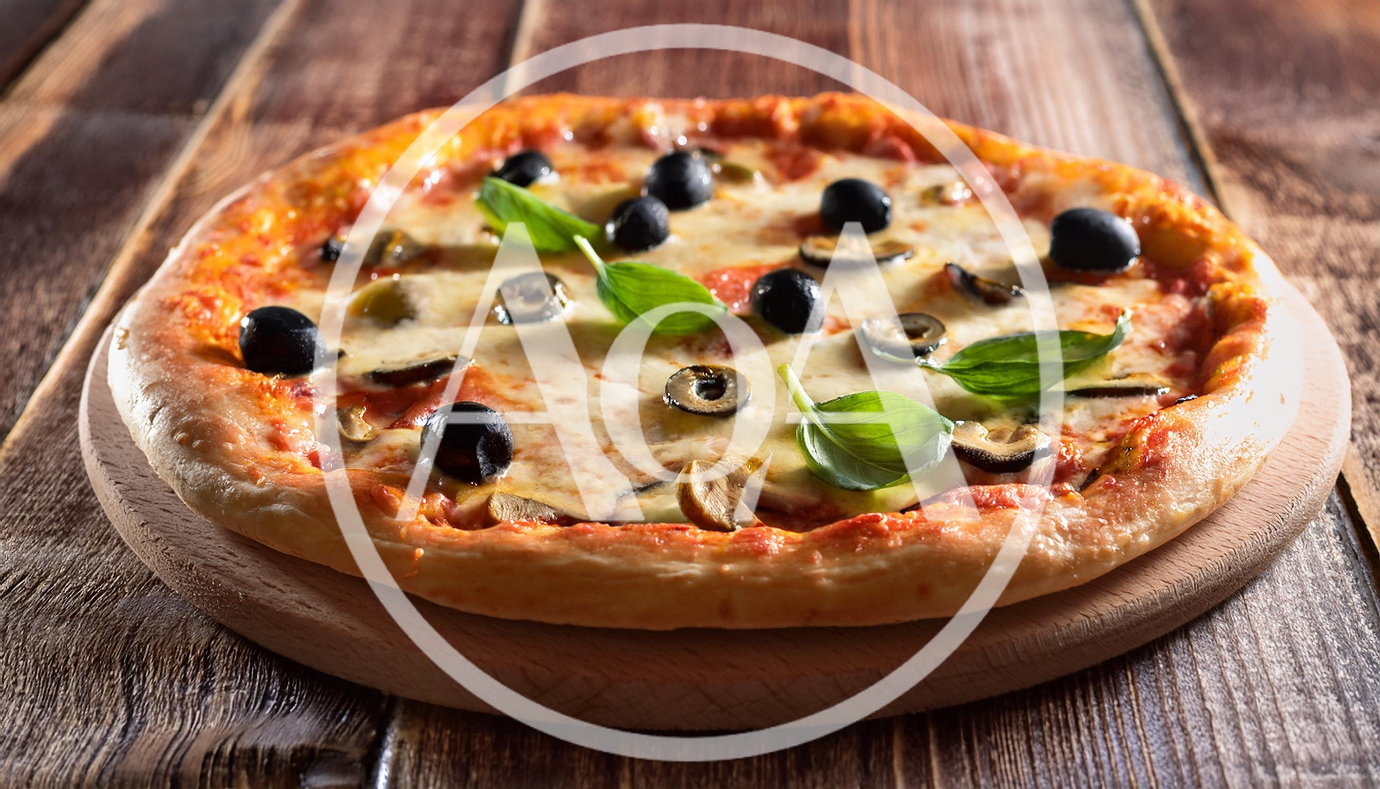 Fresh Homemade Pizza With Olives And Basil