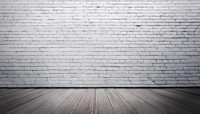 Empty Room With White Brick Wall And Wooden Floor