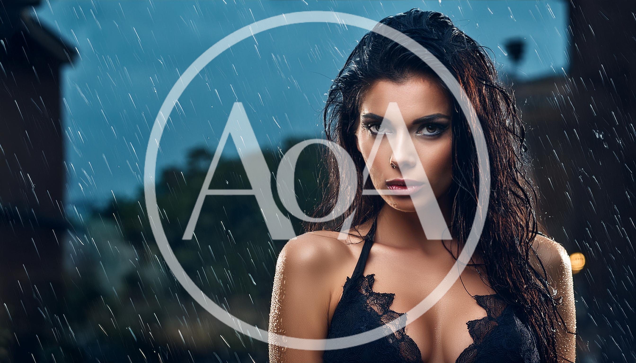 Portrait Of A Beautiful Woman Standing In The Rain
