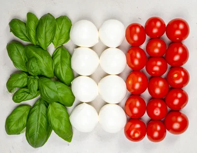 Italian Flag Made Of Fresh Basil Mozzarella And Tomatoes