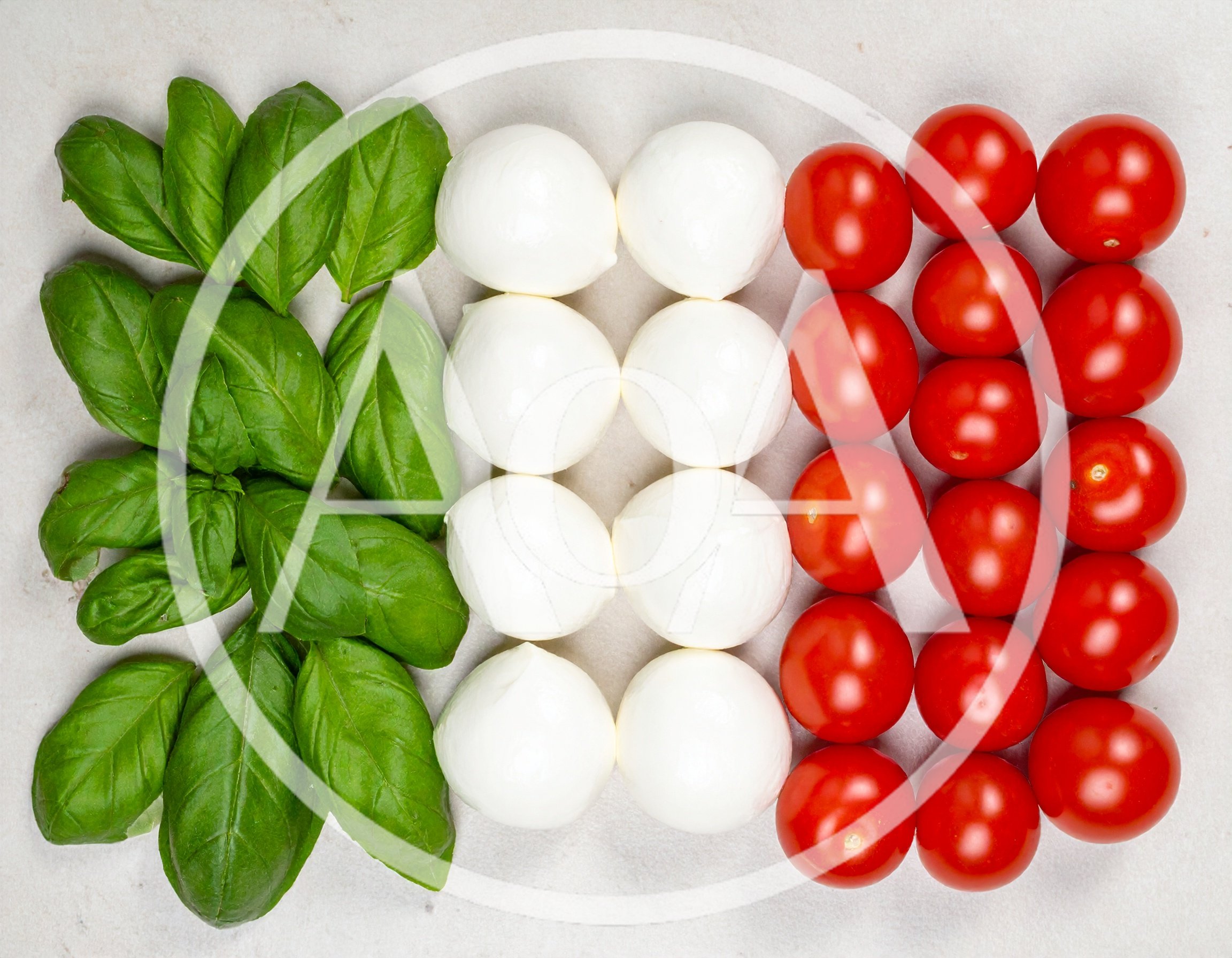 Italian Flag Made Of Fresh Basil Mozzarella And Tomatoes