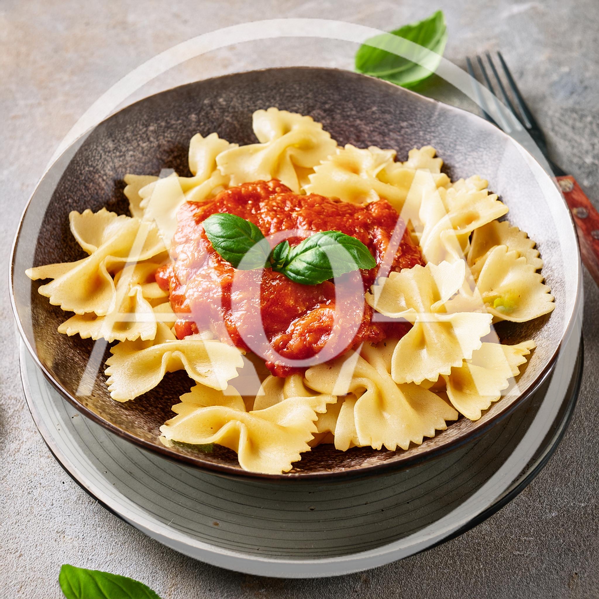 Farfalle Pasta With Tomato Sauce In A Bowl