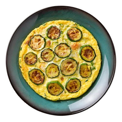Zucchini Frittata Served on a Dark Ceramic Plate
