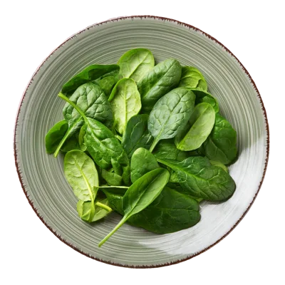 Fresh Green Spinach Leaves In A Ceramic Bowl