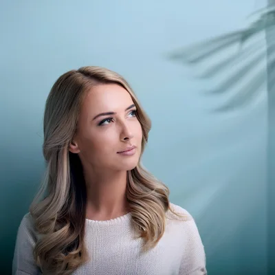 Portrait Of A Young Blonde Woman Looking Away