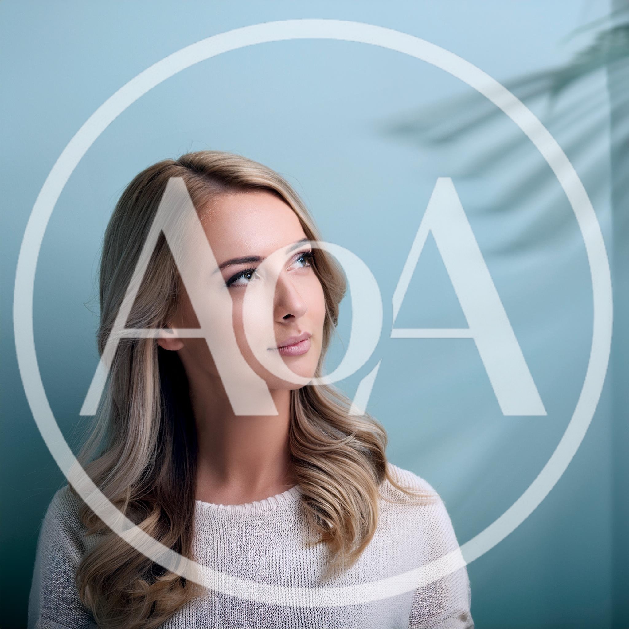 Portrait Of A Young Blonde Woman Looking Away