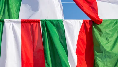 Multiple Italian Flags Hanging Outdoors