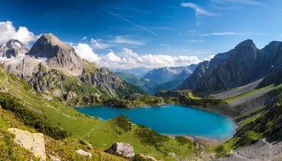 Panoramic View Of A Turquoise Alpine Lake