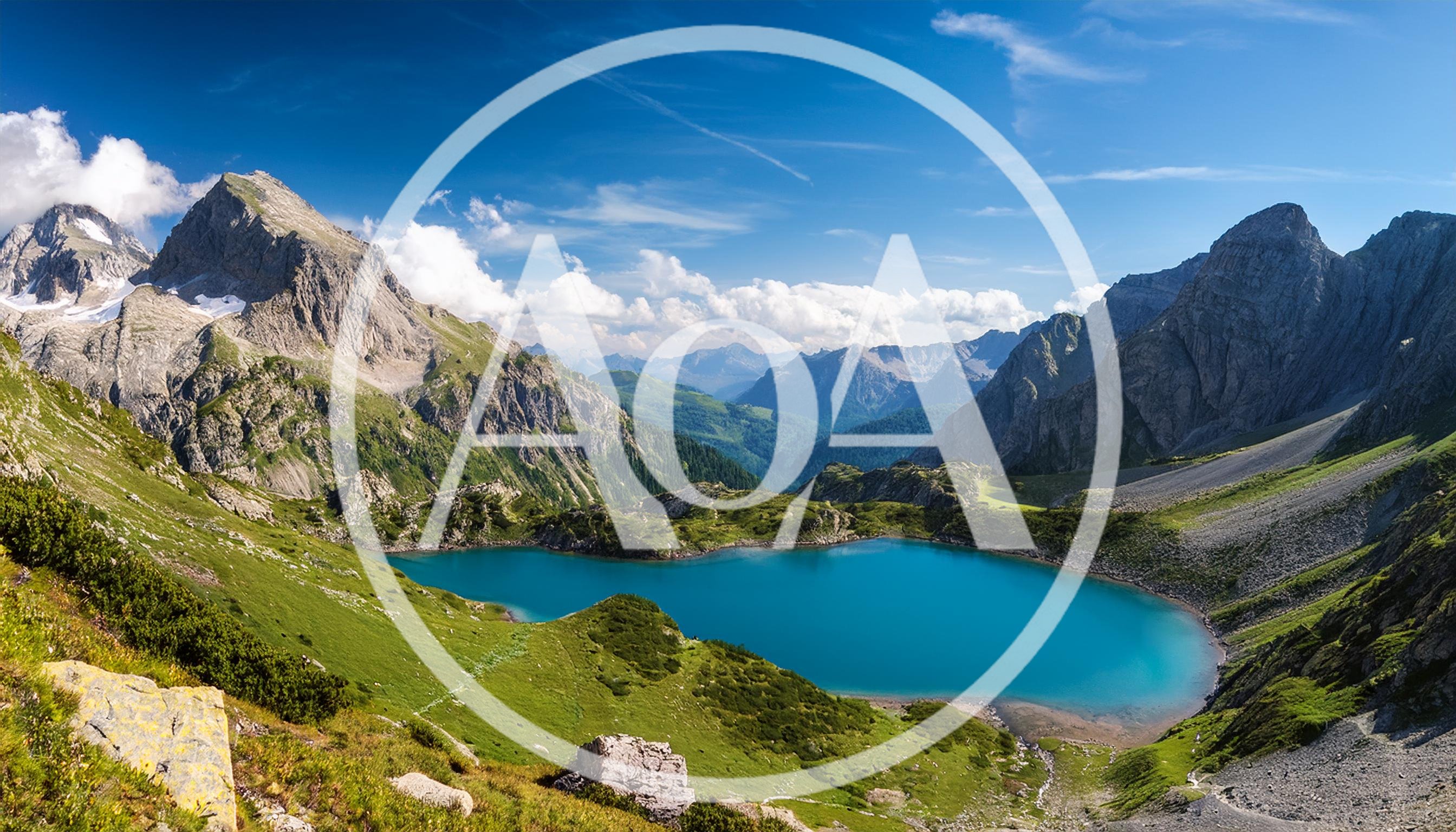 Panoramic View Of A Turquoise Alpine Lake