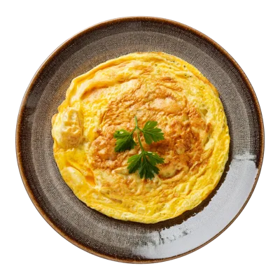 Top Down View Of A Golden Omelet On A Plate