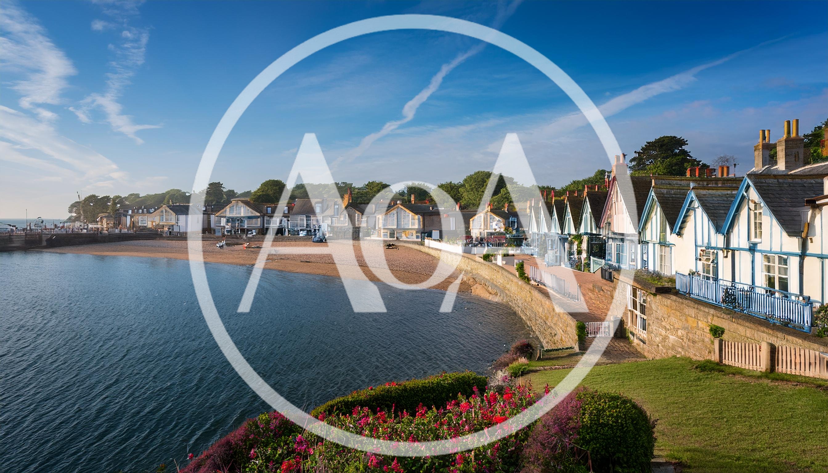 Picturesque Coastal Village With Beach And Waterfront Houses