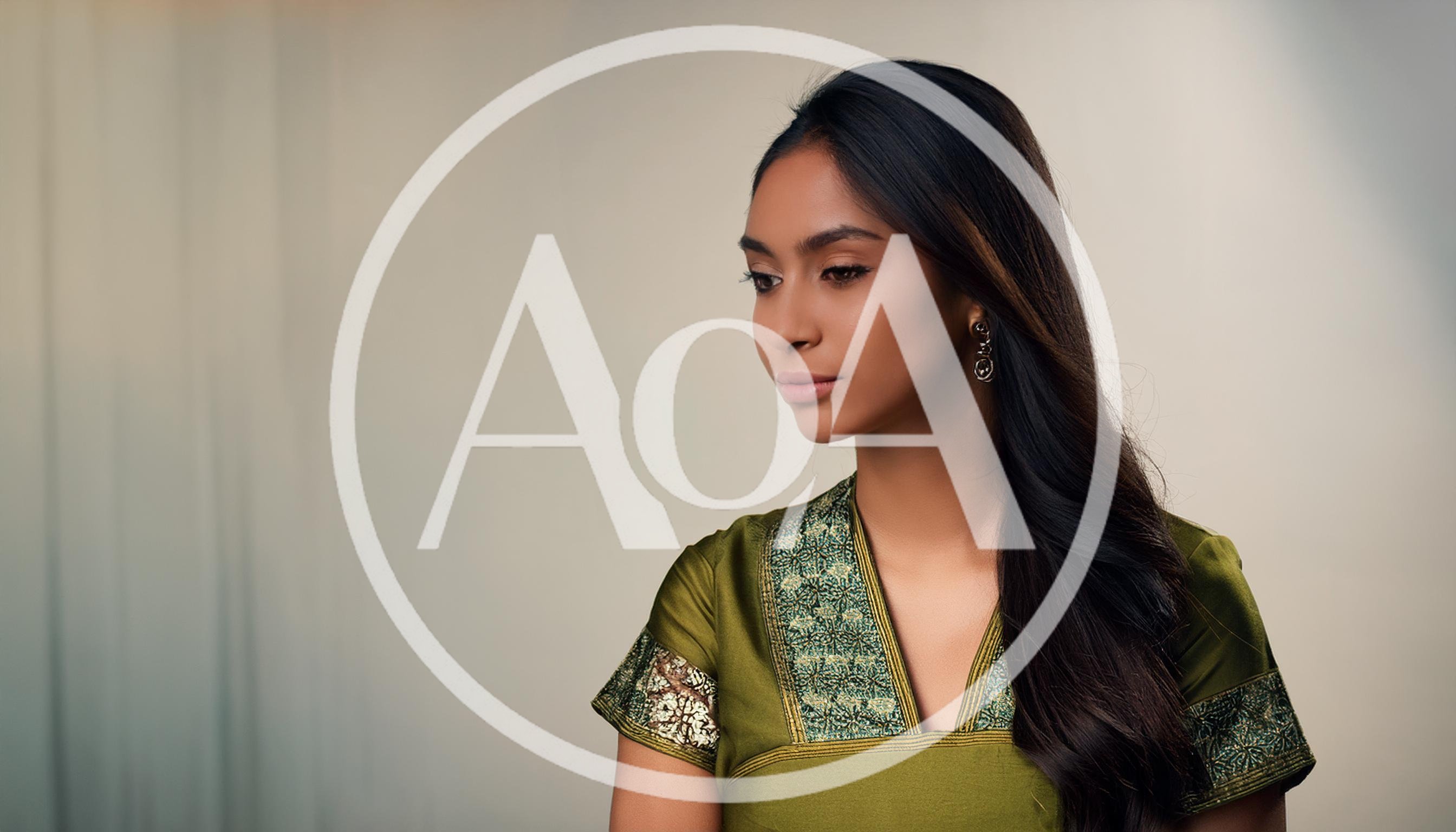 Portrait Of A Young Woman In Traditional Green Attire