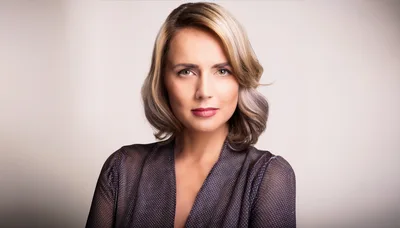 Portrait Of A Professional Woman In A Polka Dot Blouse
