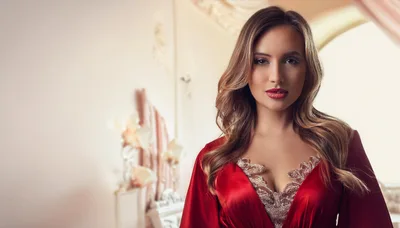 Elegant Woman In Red Silk Robe With Lace Detail