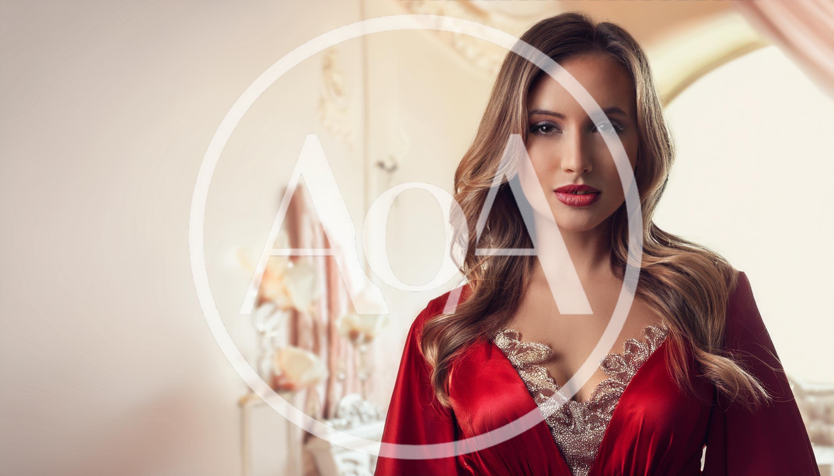 Elegant Woman In Red Silk Robe With Lace Detail