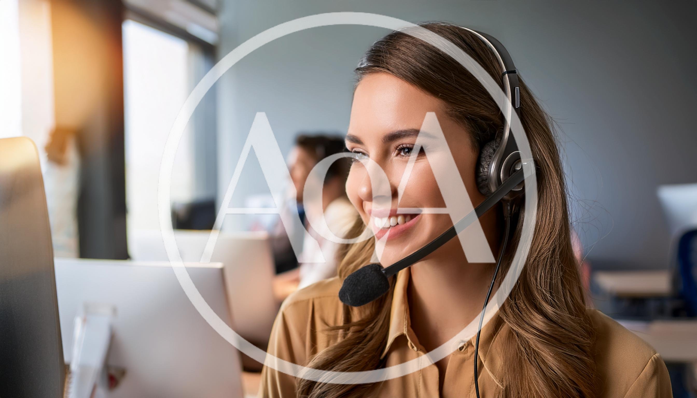 Smiling Customer Service Representative Working In Modern Office