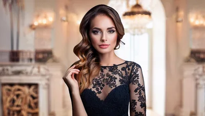 Elegant Woman In Black Lace Dress Posing In Ballroom