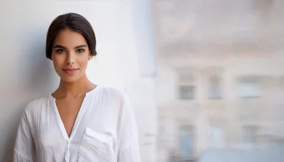 Portrait Of A Beautiful Young Woman In White Shirt