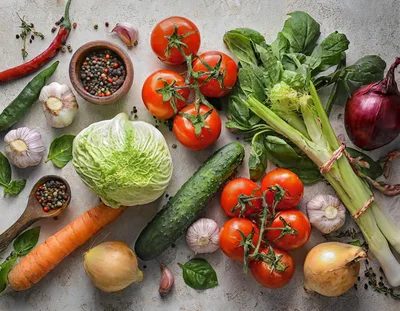 Fresh Vegetables And Spices On A Rustic Surface