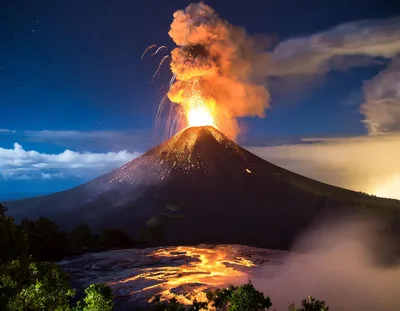 Volcanic Eruption With Lava Flow At Night