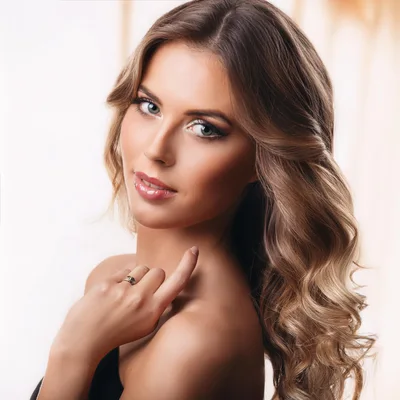 Portrait Of A Beautiful Woman With Wavy Hair