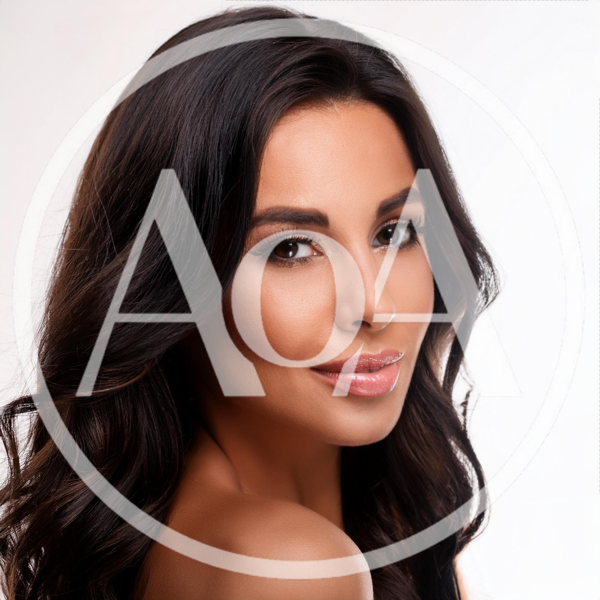 Portrait Of A Beautiful Woman With Long Dark Hair