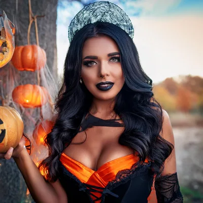 Beautiful Woman Dressed As A Witch For Halloween