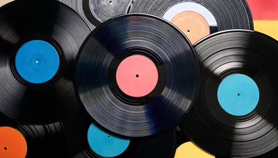 Collection Of Vintage Vinyl Records With Colorful Labels