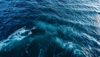 Aerial View Of Deep Blue Ocean Waves