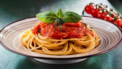 Spaghetti Pasta With Tomato Sauce And Fresh Basil