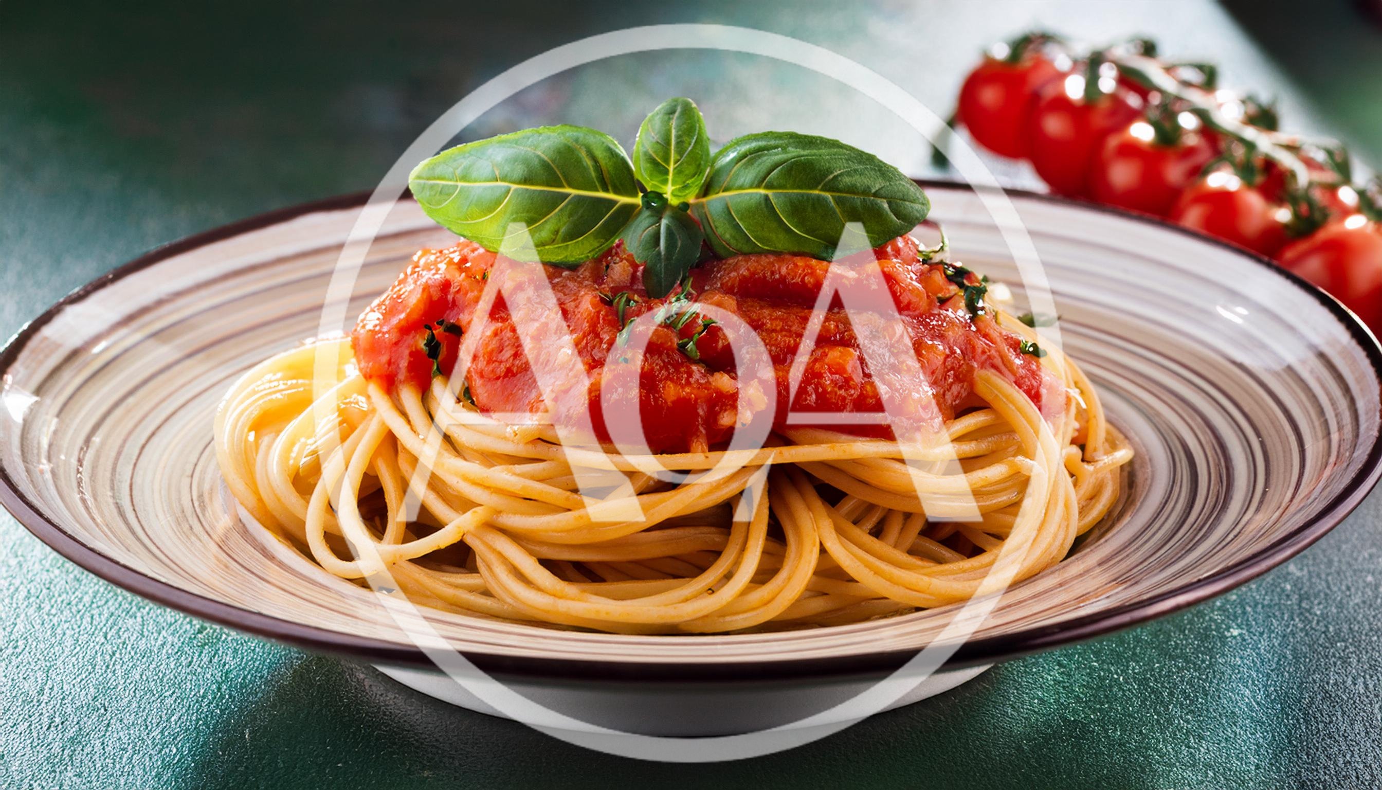 Spaghetti Pasta With Tomato Sauce And Fresh Basil