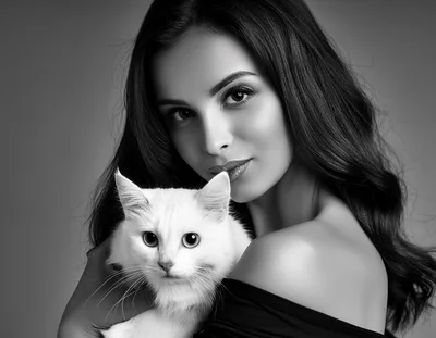 Beautiful Woman Holding A Fluffy White Cat