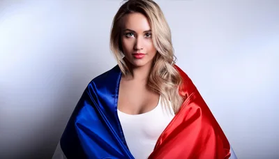 Blonde Woman Wrapped In A French Flag