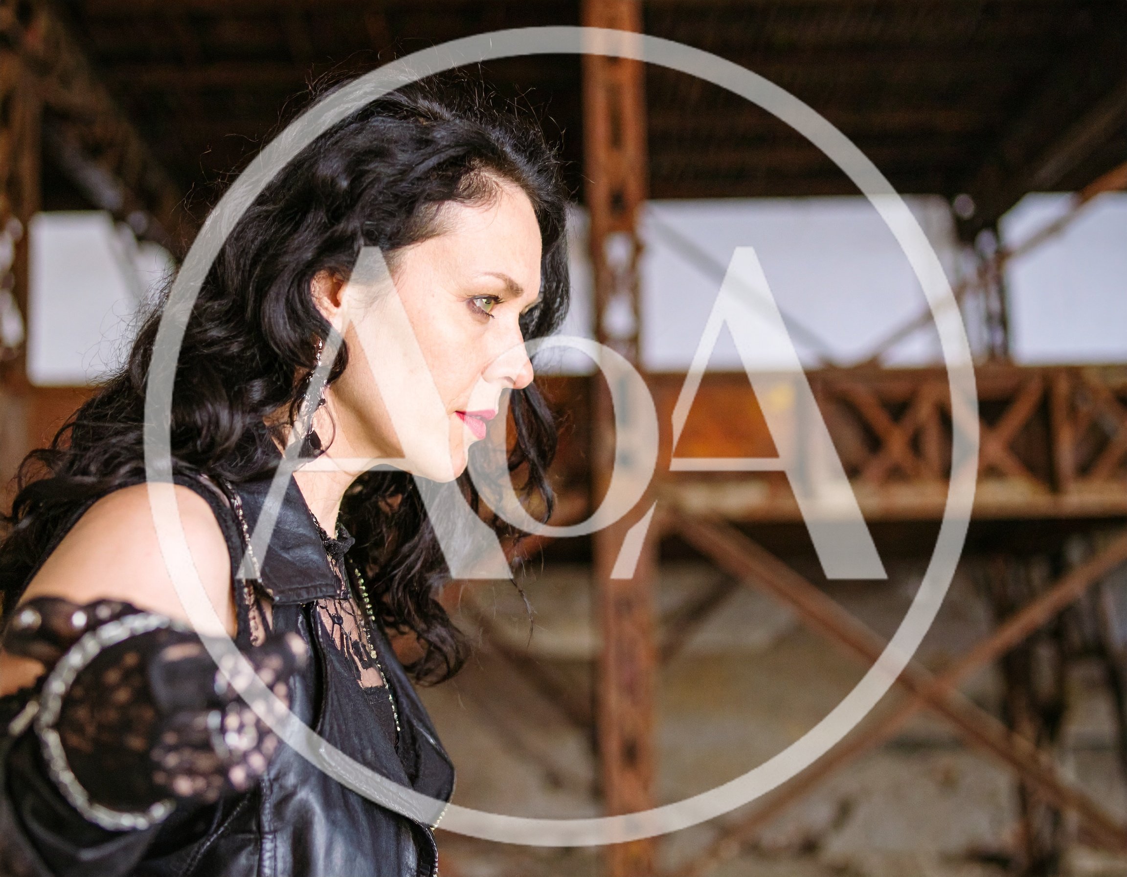 Gothic Woman Posing in Abandoned Industrial Building