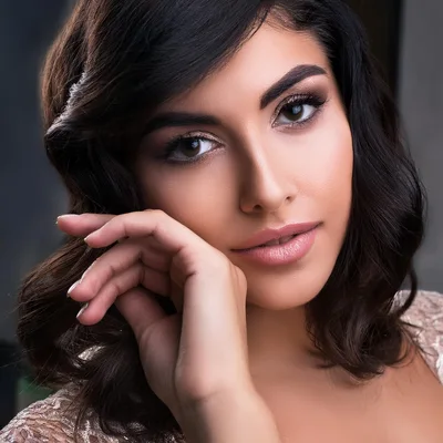 Portrait Of A Beautiful Woman With Wavy Hair
