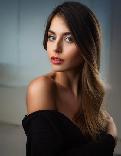 Portrait Of A Beautiful Young Woman Looking Over Shoulder