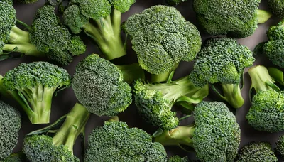 Fresh Green Broccoli Florets Arranged On Dark Background