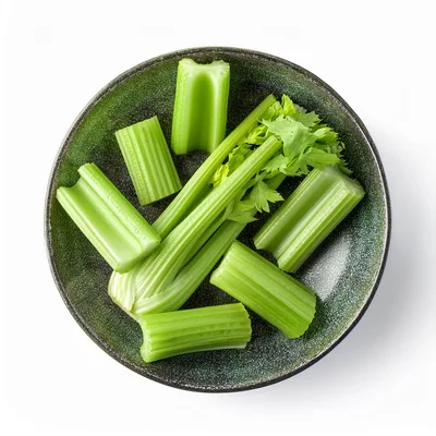 Fresh Celery Stalks In A Dark Green Bowl