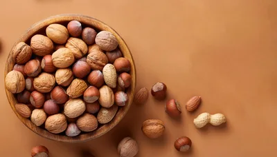 Assorted Mixed Nuts In A Wooden Bowl
