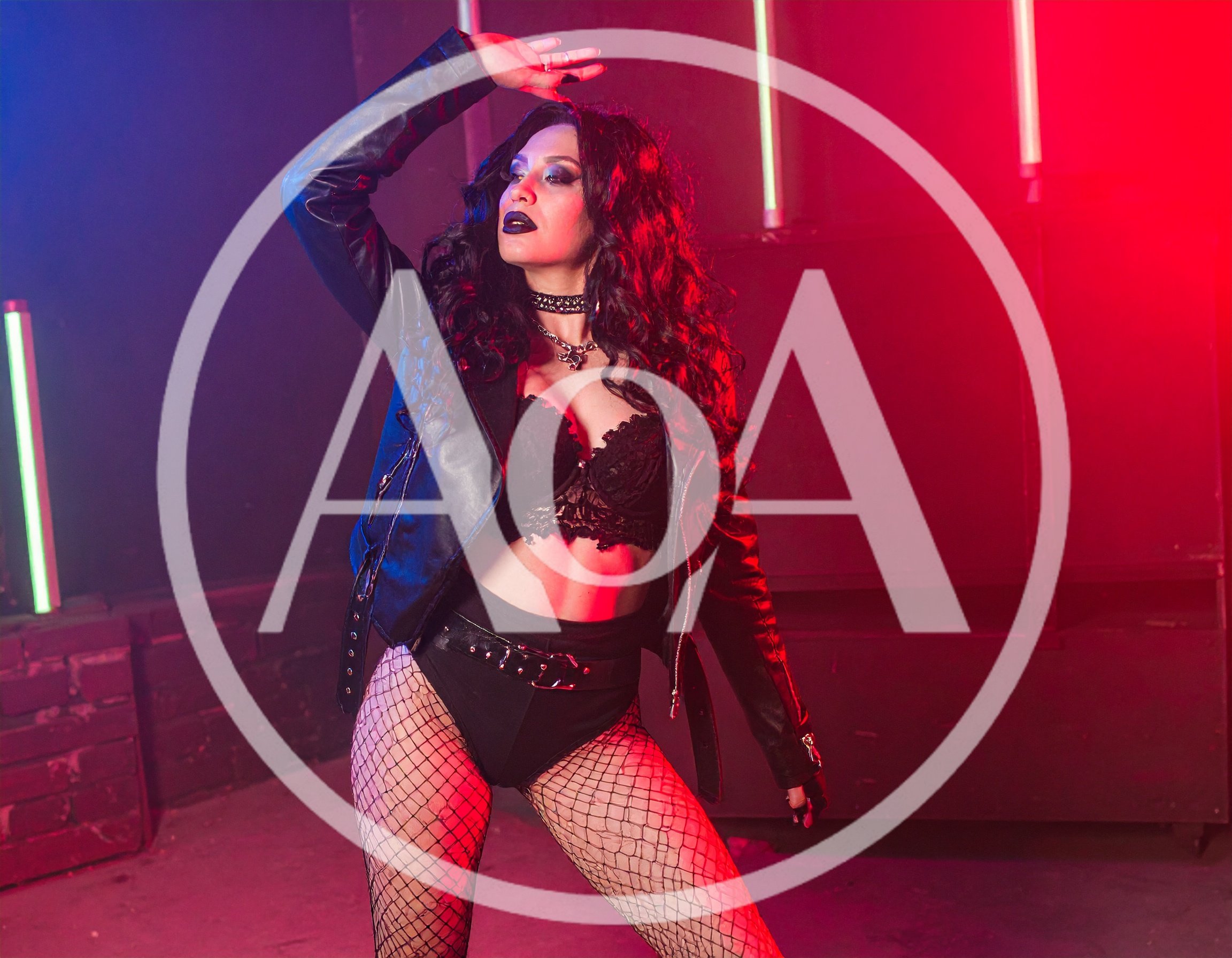 Gothic Woman Dancing in Neon Lit Studio