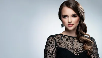 Elegant Young Woman In Black Lace Dress