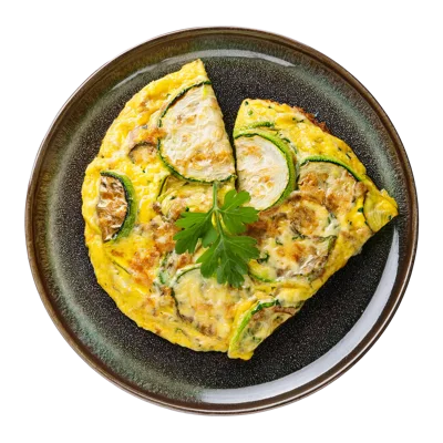 Zucchini Omelet Served On A Dark Ceramic Plate