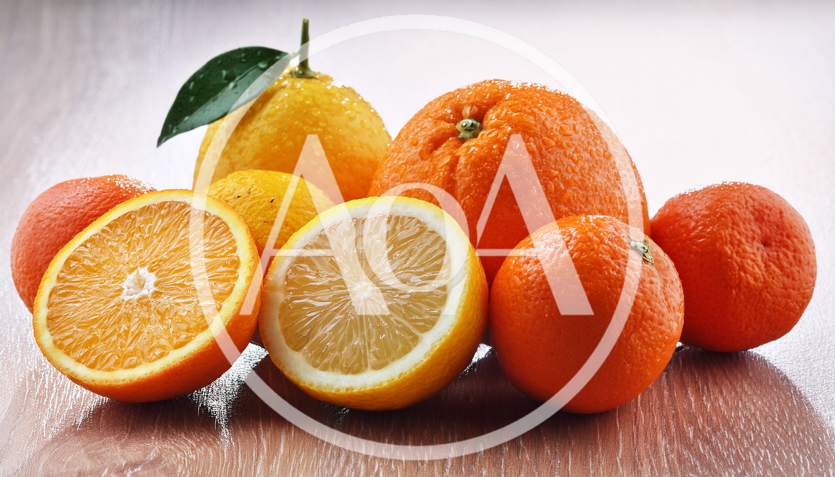 Fresh Citrus Fruits Arrangement on Wooden Surface