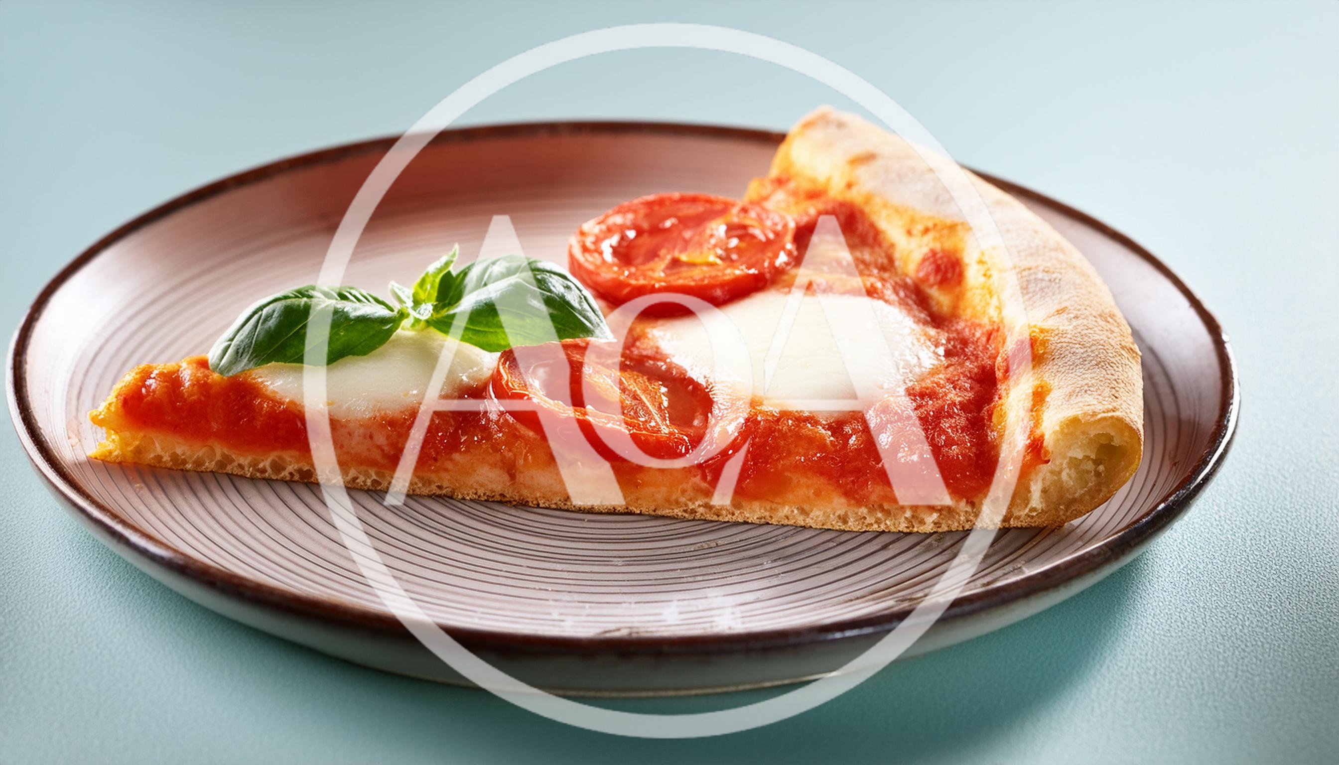 Single Slice Of Margherita Pizza On A Plate