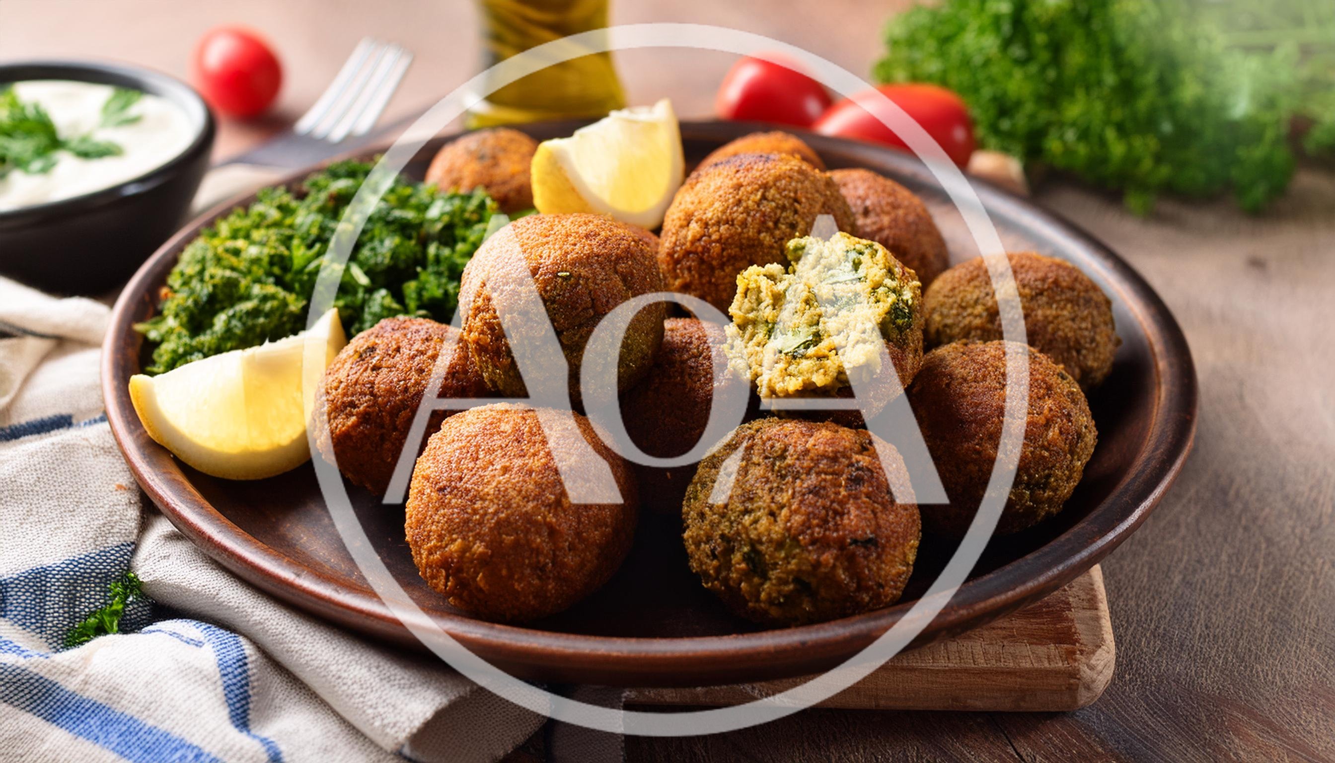 Fresh Falafel Balls Served On A Rustic Plate